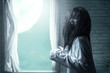 © Leo Lintang - A scary ghost woman with blood and an angry face haunted the abandoned house