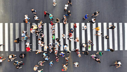 crowded pedestrian crosswalk. top view from drone.