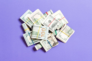 US Dollar bills bundles stack. one hundred dollar bills with stack of money in the middle. Top view of business concept on background with copy space