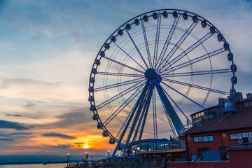 Sticker - The ferris wheel on the waterfront of Seattle, Washington in late afternoon light