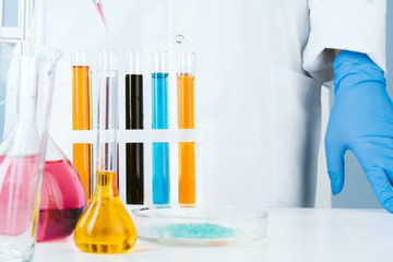 Scientist working with chemical samples in laboratory close up