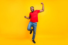 Full Length Body Size Photo Of Rejoicing Glad Cheerful Happy Black Man Dancing With Joy While Isolated With Yellow Background