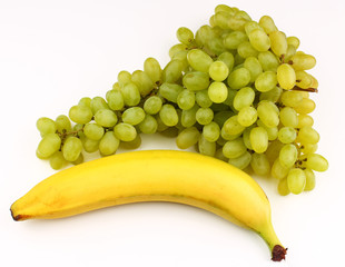 Wall Mural - White grapes and banana on a white background