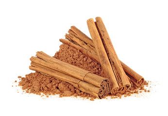 Ceylon cinnamon sticks with powder on a white background