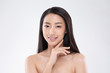 © 220 Selfmade studio - Beautiful Asian woman touching soft cheek smile with clean and fresh skin Happiness and cheerful with positive emotional,isolated on white background,Beauty and Cosmetics Concept