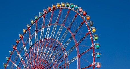 Wall Mural - Ferris wheel with clear blue sky