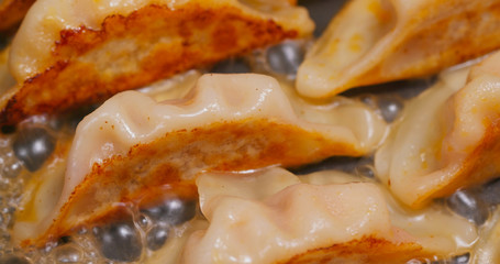 Canvas Print - Fry meat dumpling on pan