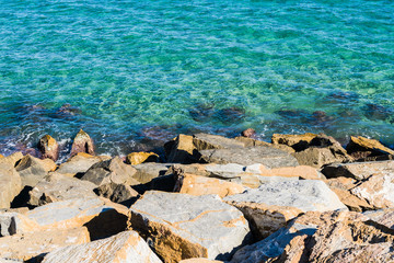 Amazing beautiful blue ocean and rocks on a sunny day, natural outdoor landscape by the beach