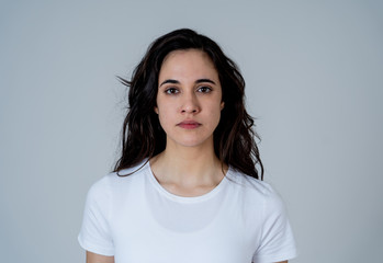 portrait of beautiful young latin woman with angry and furious face. human expressions and emotions