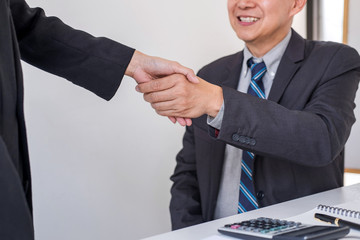 Aufkleber - Business partnership meeting, Two confident Business handshake and business people after discussing good deal of Trading contract and new projects for both companies, success, partnership