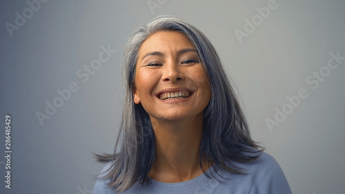 Fotografía Beautiful Asian Woman With A Broad Smile