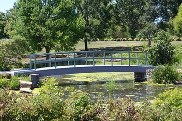  The old blue wood bridge in the garden park.