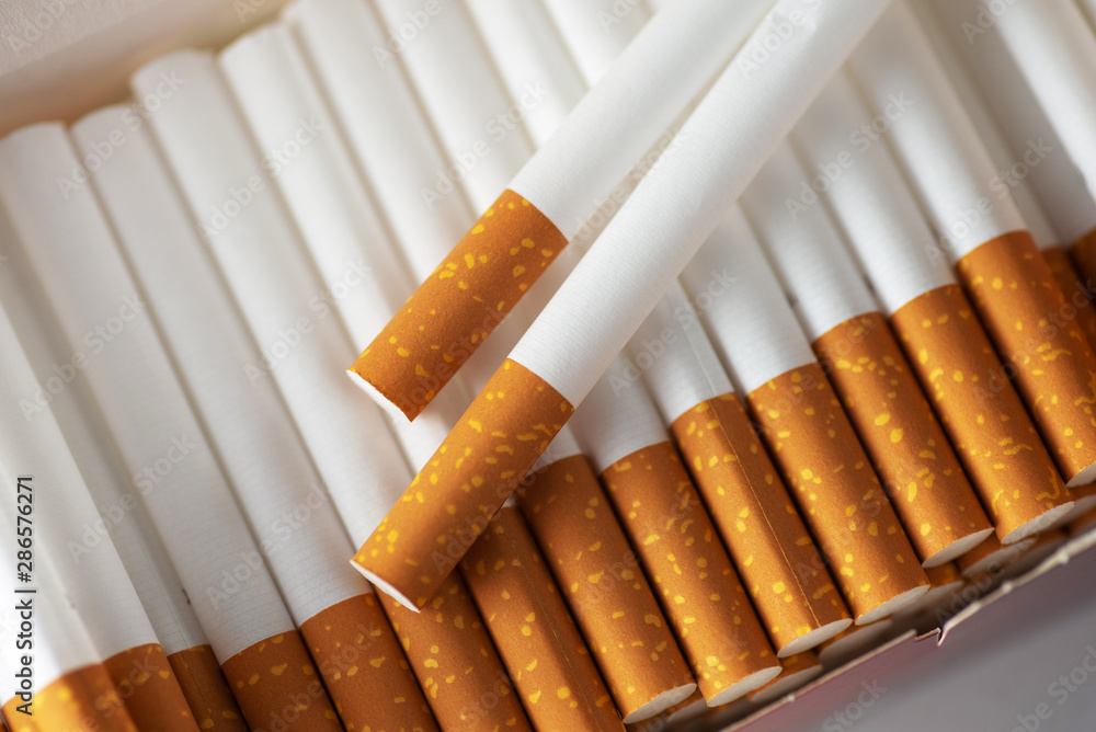 Close up of a smoking cigarettes . cigarette filter tubes Stock Photo