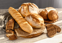 Assortment Of Fresh Bread On Table