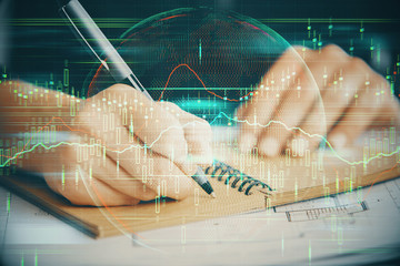 Forex chart displayed on woman's hand taking notes background. Concept of research. Double exposure