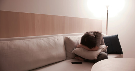 Wall Mural - woman feel depressed on sofa