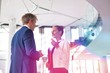 © MDBPIXS - Businessman and young businesswoman discussing at new office