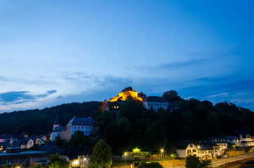 Wall Mural - View of Blankenheim Castle in the evening. Blankenheim Castle (German: Burg Blankenheim) is a schloss above the village of Blankenheim in the Eifel mountains of Germany.