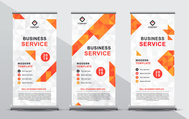 Wall Mural - Set of three orange roll up banner template. Modern abstract geometric polygonal design composition with portrait presentation.