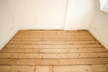 Wall Mural - Wooden plank floor background texture close-up light colors