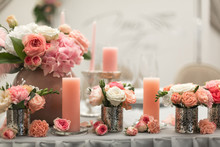 Decor For The Holiday Table. Natural Flowers Candle Holders In Pink Colors.