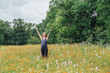 © Inti St. Clair - Pregnant woman doing yoga in garden