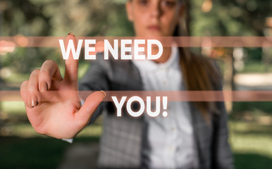 Word writing text We Need You. Business photo showcasing asking someone to work together for certain job or target Business woman in the nature pointing with the finger into empty space