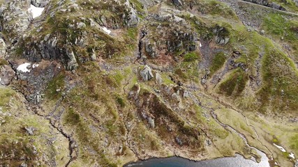 Wall Mural - Aerial view. Lake in stone rocky mountains. Norway landscape. Norwegian national tourist scenic route Ryfylke