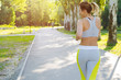 © fotofabrika - Sporty young woman in sportswear running in the park in the morning