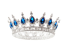 Beauty Pageant Winner, Bride Accessory In Wedding And Royal Crown For A Queen Concept With A Silver Tiara Covered Diamonds And Blue Sapphire Stones Isolated On White With Clipping Path Cutout