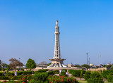 Fototapeta  - Minar-e-Pakistan, a national monument in Lahore, Pakistan on the blue sky background