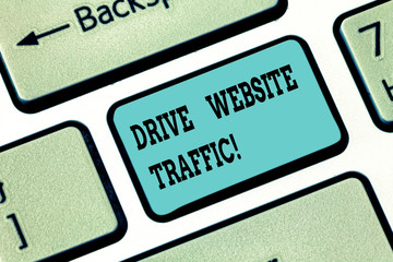 Conceptual hand writing showing Drive Website Traffic. Business photo text Increase the number of visitors to business website Keyboard key Intention to create computer message idea