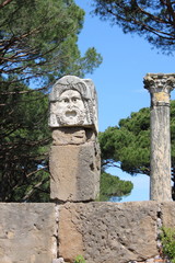 Wall Mural - Satiric mask in Ostia Antica. Rome, Italy