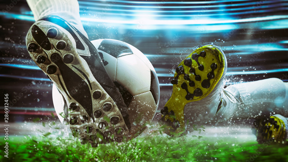 Football scene at night match with close up of a soccer shoe hitting the ball with power - obrazy, fototapety, plakaty 