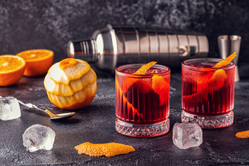 Wall Mural - Negroni cocktail with orange peel and ice.