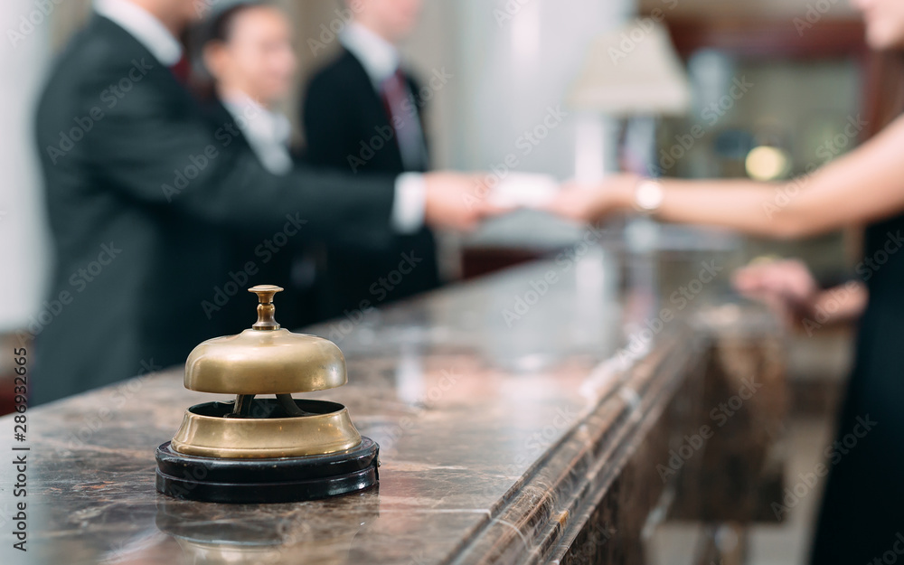 Picture of guests getting key card in hotel. - obrazy, fototapety, plakaty 