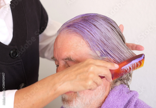 A Handsome Senior Man With White And Gray Hair And Beard