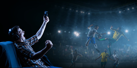 Poster - Young man playing football video game