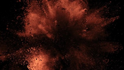 Super Slow Motion Shot of Cocoa Powder Explosion Isolated on Black Background at 1000fps. Shooted with High Speed Cinema Camera at 4K.