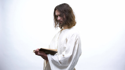 Canvas Print - Saint prophet reading Bible illuminated with light, prayer and faith in God