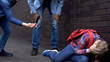 © motortion - Teenage bloggers mocking nerd and broadcasting on smartphone, online bullying
