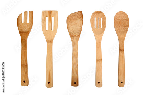 Fotomural wooden kitchen utensils isolated on white background