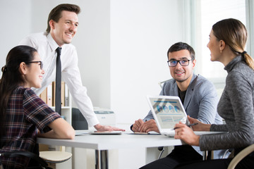 Poster - Businessman tells his colleagues about a new project