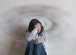 © Chinnapong - Vertigo illness with dizziness in woman patient feeling dizzy, faint with spinning movement inside head from benign paroxysmal positional vertigo (BPPV), migraine headaches, or hearing loss problem