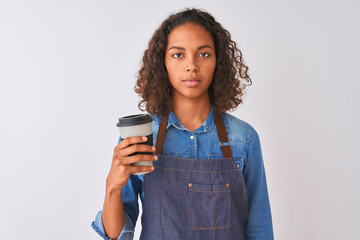 Canvas Print - Young brazilian barista woman drinking take away coffee over isolated grey background with a confident expression on smart face thinking serious