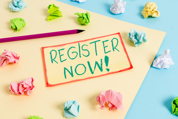 Writing note showing Register Now. Business concept for official list or record showing or things into web or forum Colored crumpled papers empty reminder blue yellow clothespin