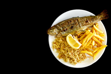 Wall Mural - Fried fish with rice and lemon