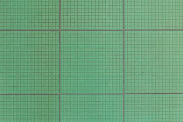 Old green floor tiles  texture background