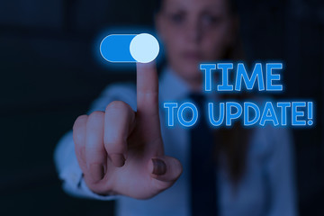 Wall Mural - writing note showing time to update. business concept for this right moment to make something more m
