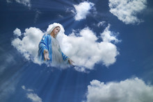 Mary On White Clouds With Light Ray At Heaven. Religion,